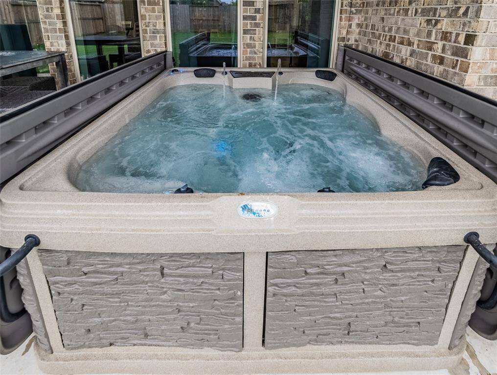 This 4 person hot tub stays with your new home just In time for summer