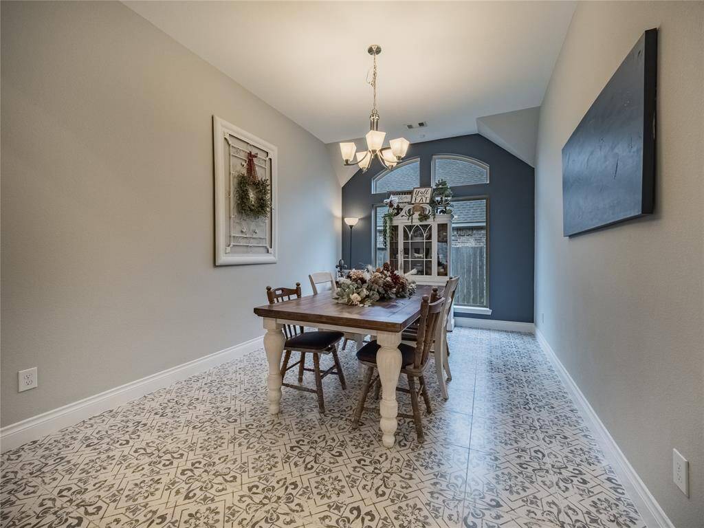 Formal dining room with the beautiful accept wall and tile to match