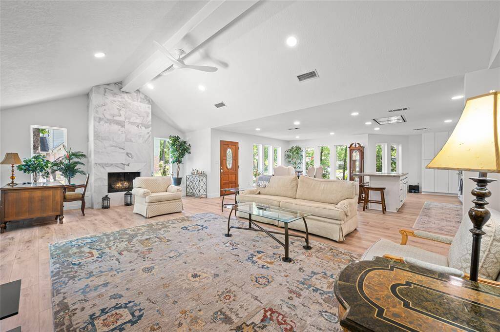 Living room, looking into dining space. So much light!