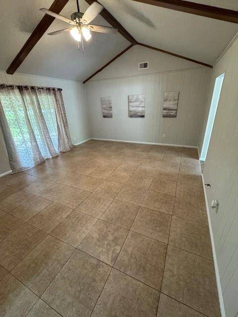Large Living Room area with sliding glass doors to the backyard
