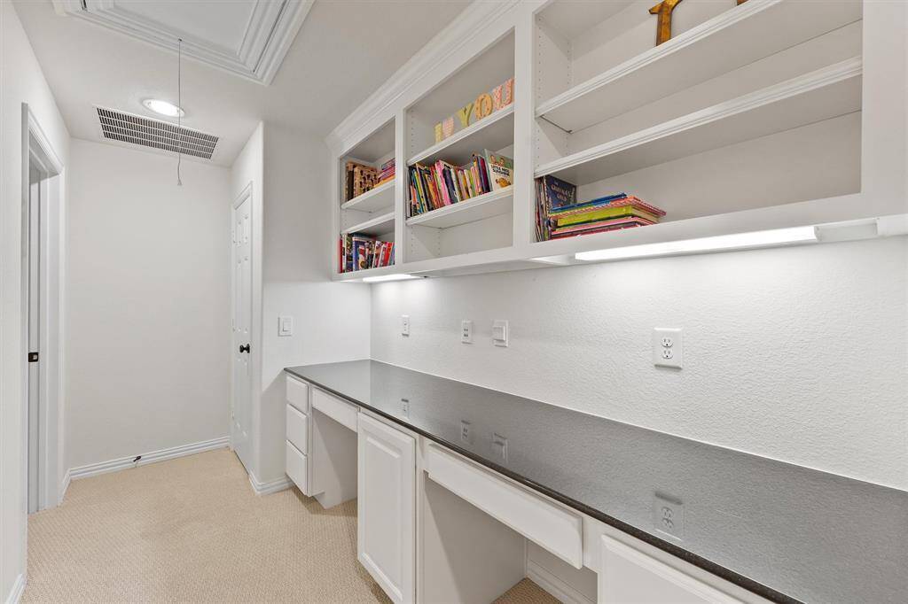 Hallway/Landing with built in bookshelf and desk
