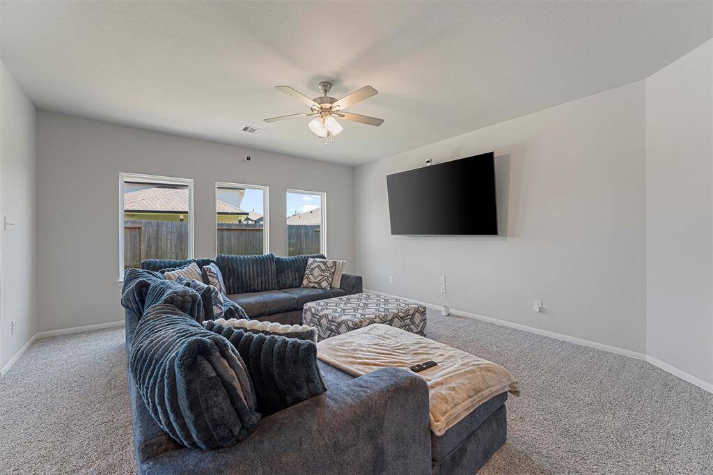 Spacious open-concept living area with abundant natural light.
