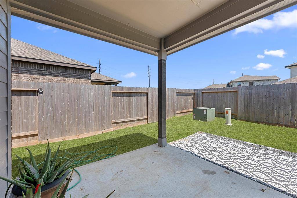 Enjoy year-round outdoor living under the covered patio perfect for relaxing evenings, weekend BBQs, or your ideal outdoor setup.