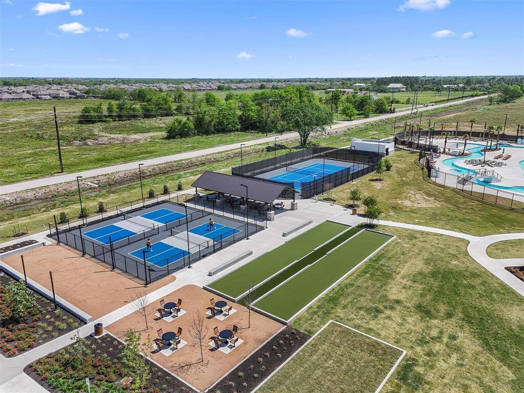 Enjoy a game of basketball or soccer with friends on the full-sized courts and spacious sports fields surrounded by walking trails.