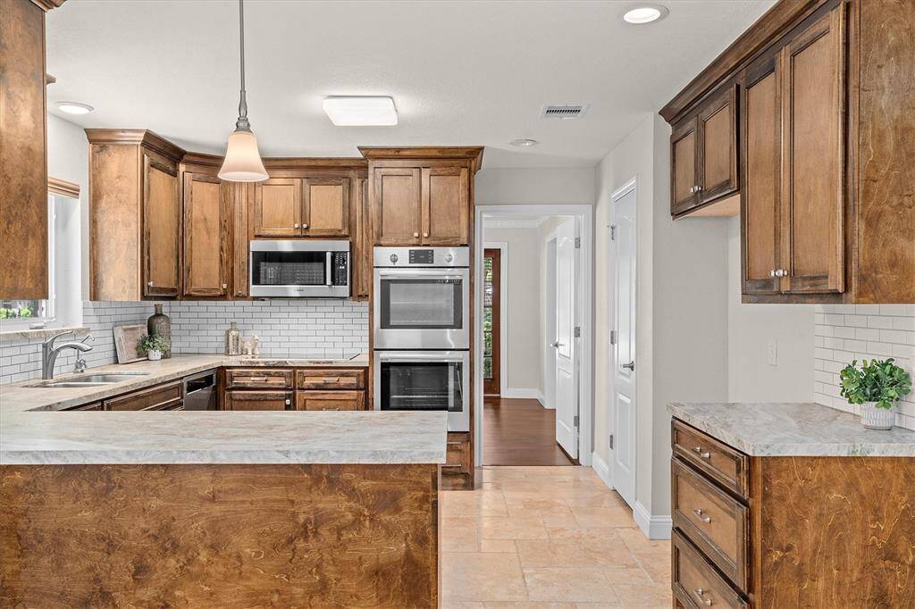 Exotic natural marble in kitchen with leather finish