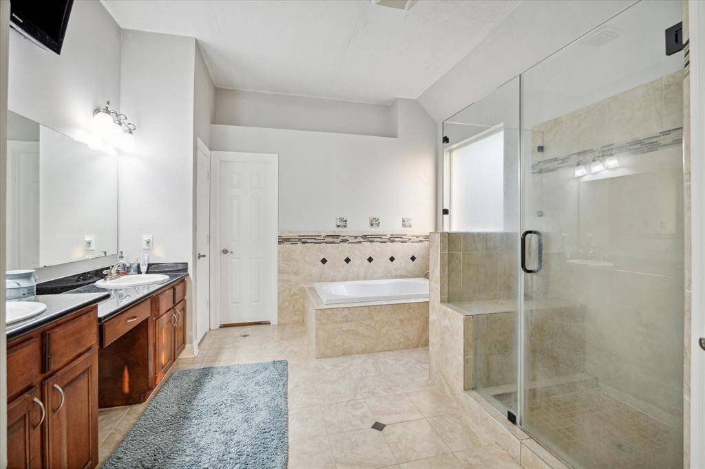 With all of those features at this price, you must have to compromise somewhere, right? Not in this gem. Take a look at this gorgeously updated and well accommodated primary restroom.
