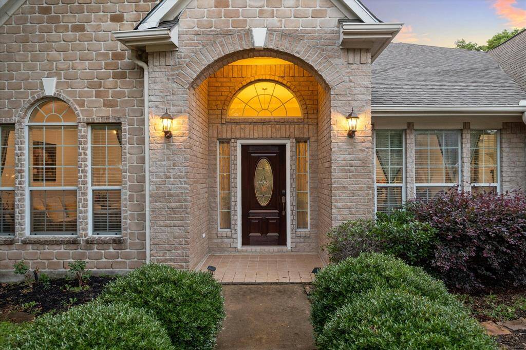 Let's walk in through the beautiful covered entryway.
