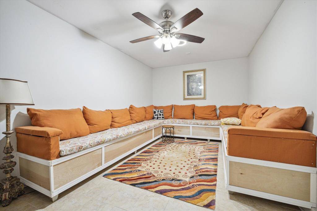 Okay, so how unique is this?! This massive bonus room can be used as a media room, excercise room (although Stone Gate has one for your use), and the custom built in seating conveys.