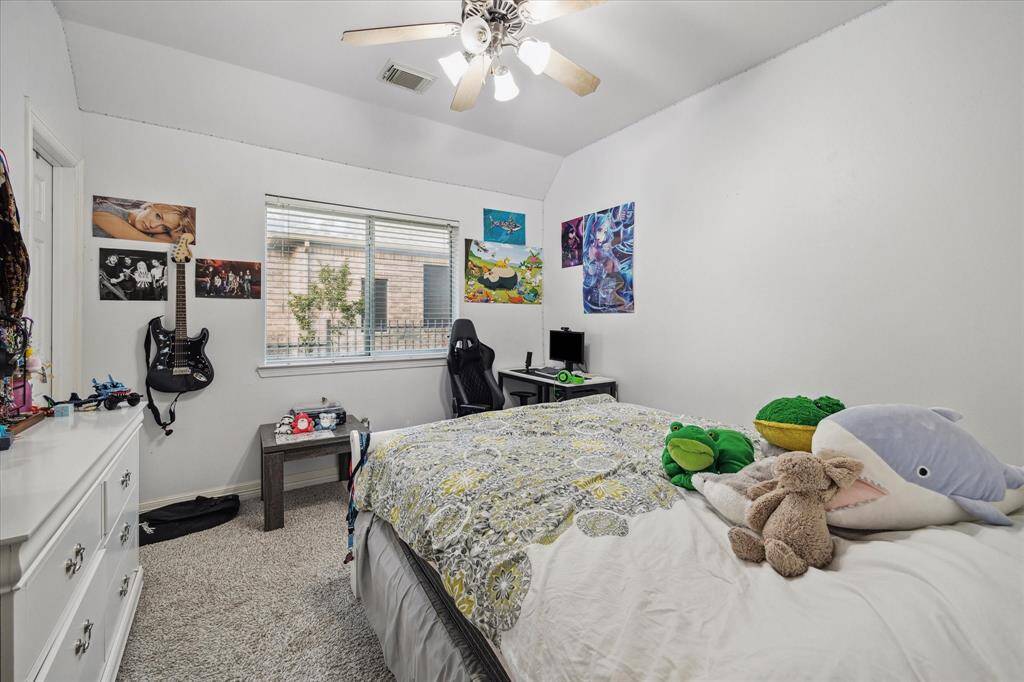 Guest bedroom one. There are no tiny bedrooms in this home. All of the rooms have ample space for your loved ones and or guests.