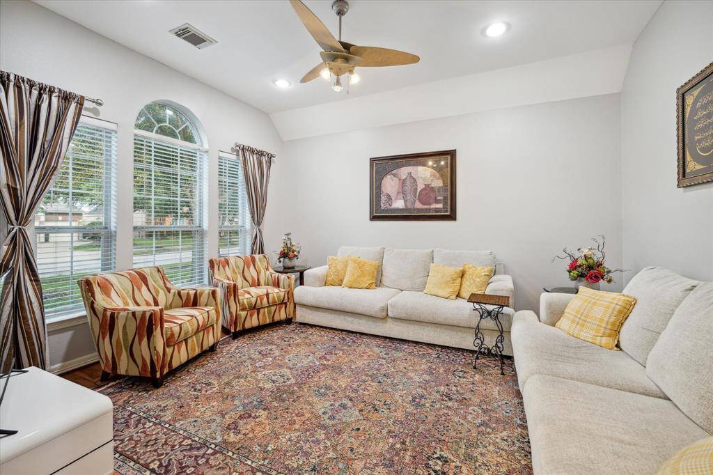 To the left is your formal living room, which could also serve as a study/office, play room, or flex space.