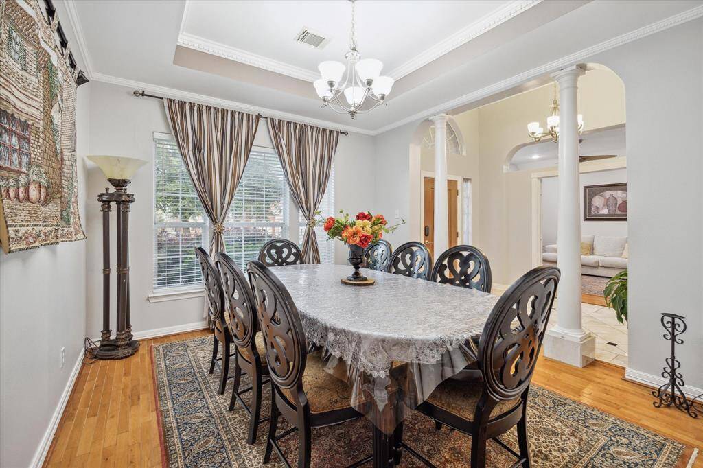 Another view of the formal dining room looking to the entryway and formal dining across the way.