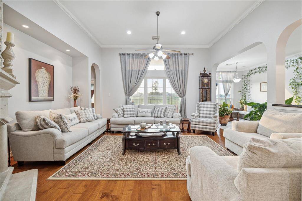 How's this for a welcome home? Stunning views of the golf course immediately greet you and your guest upon entering the den, which is open to the kitchen and breakfast areas.