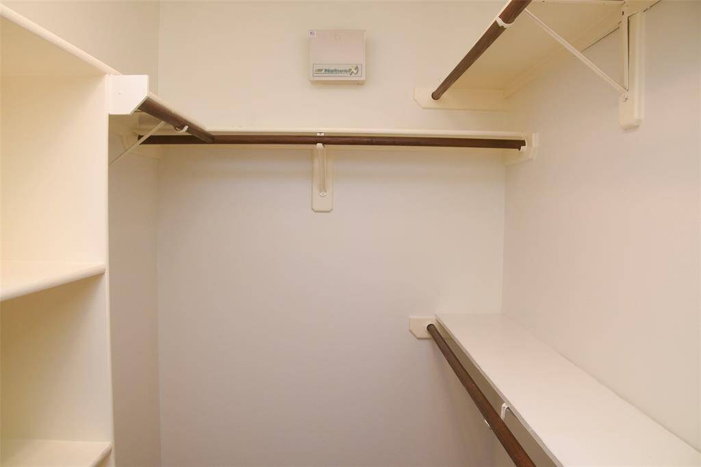 Plenty of room in the primary closet.