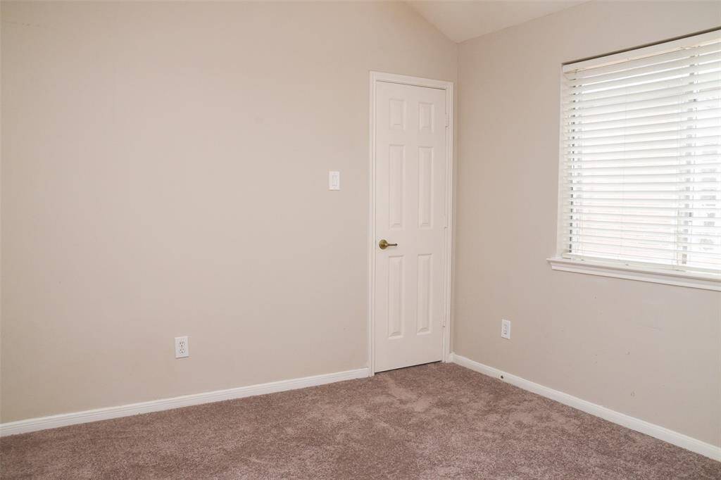 2nd bedroom with brand new carpet.