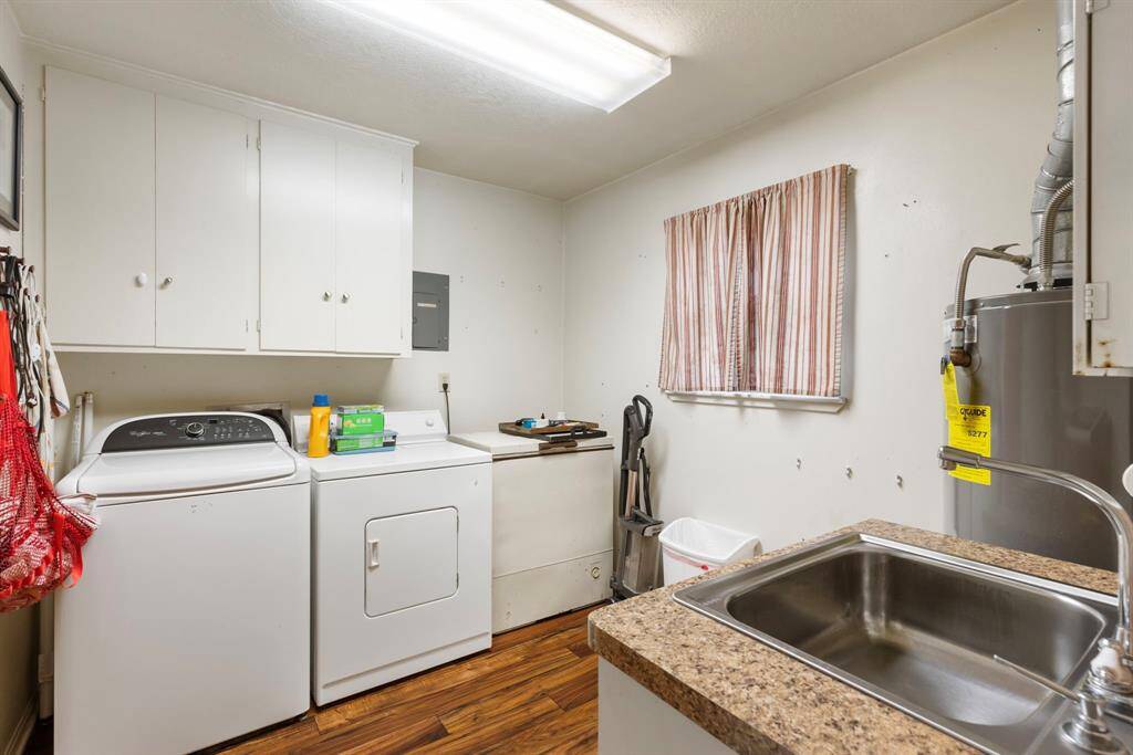 Laundry room with a sink