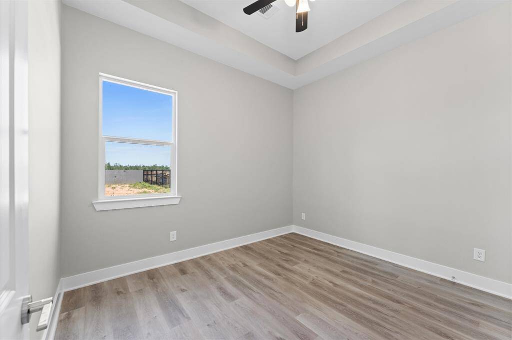 Third bedroom with modern finishes and no carpet.
