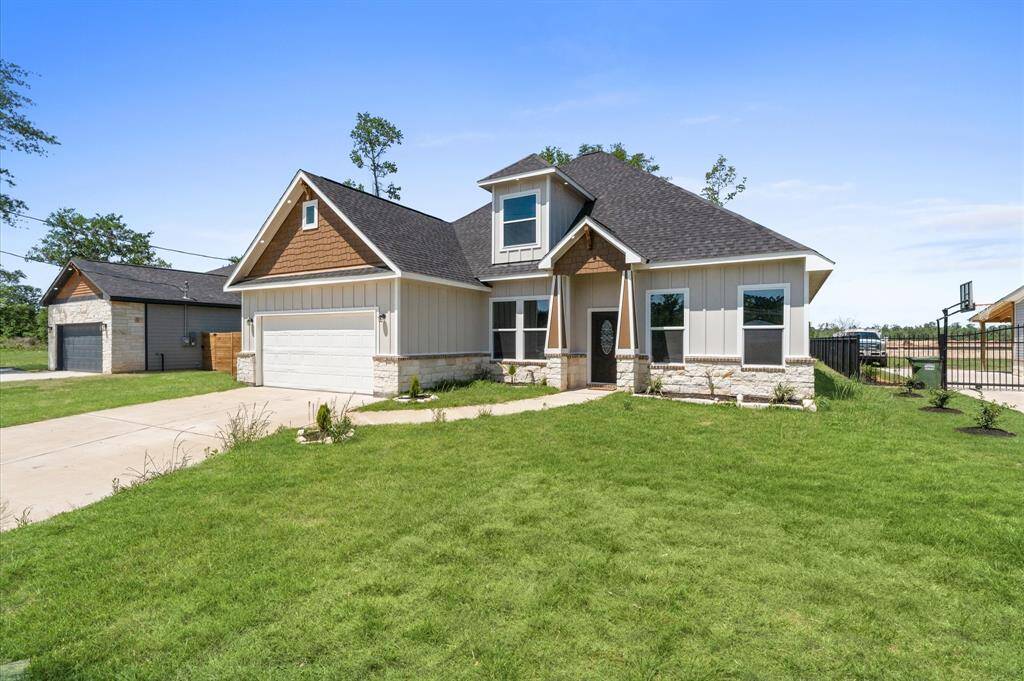 Beautiful new construction with modern curb appeal and extended driveway.
