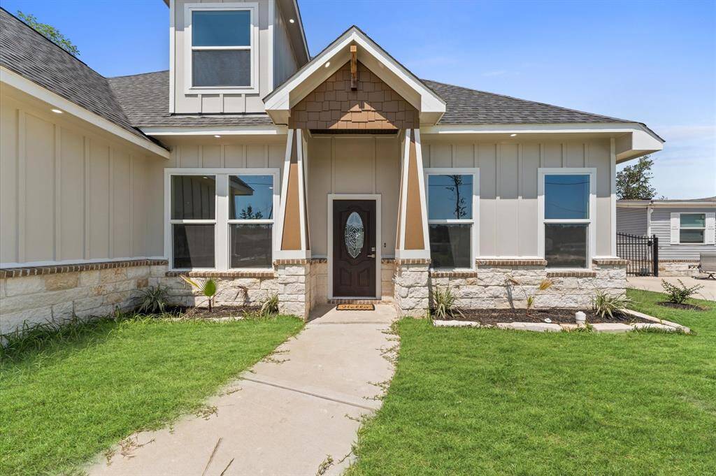 Beautiful new construction with modern curb appeal and extended driveway.
