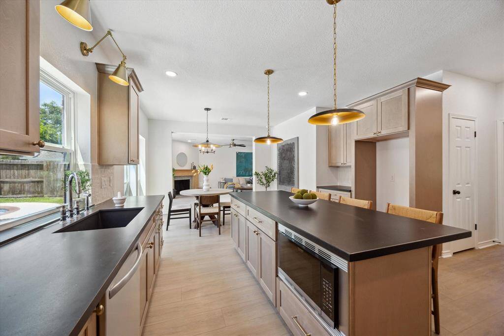 You'll love the absolute black granite tops. Tons of bar seating on the huge kitchen island.