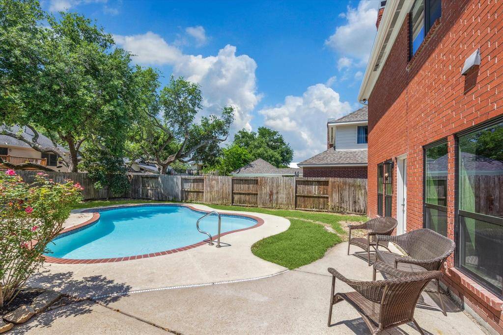 Relax or play in the ample backyard. You can't beat your pivate pool.