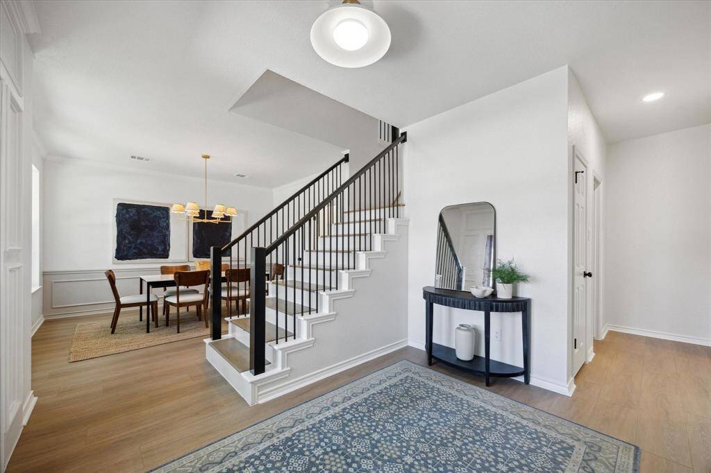 Come on in! From the front door, you have comfortable access to the dining room and home office.