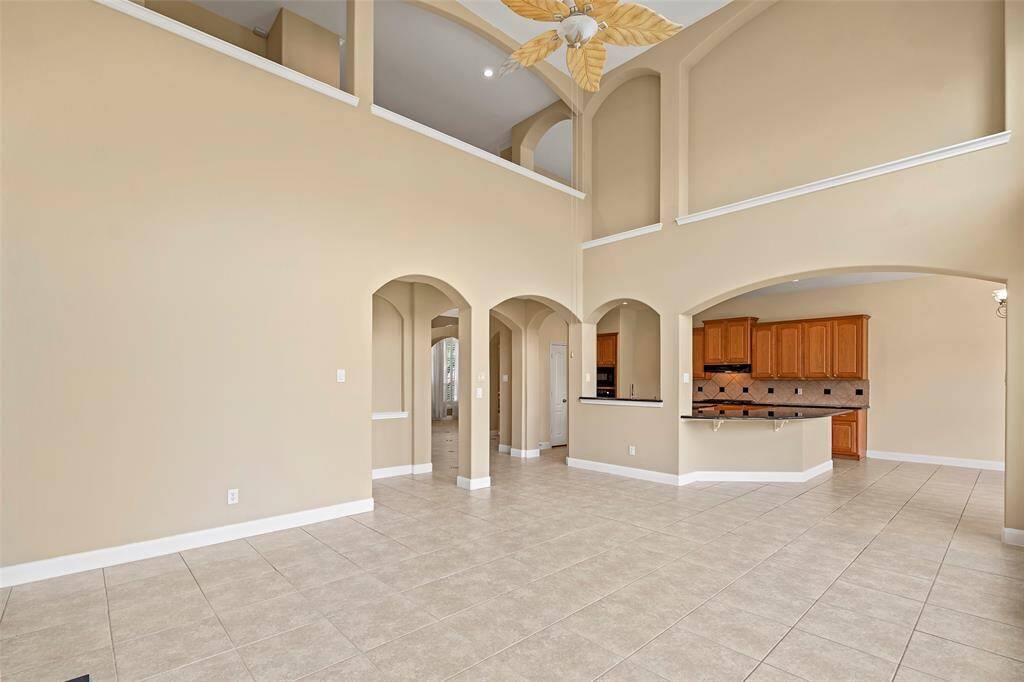 Spacious open-concept living area seamlessly connects to the kitchen and breakfast nook.
