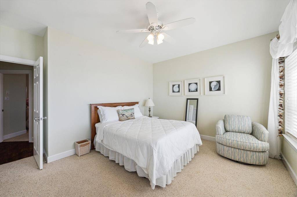Bedroom #4 with walk-in closet and 3rd floor balcony access.