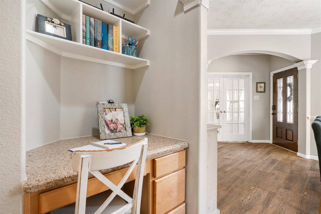 Desk area between kitchen and dining