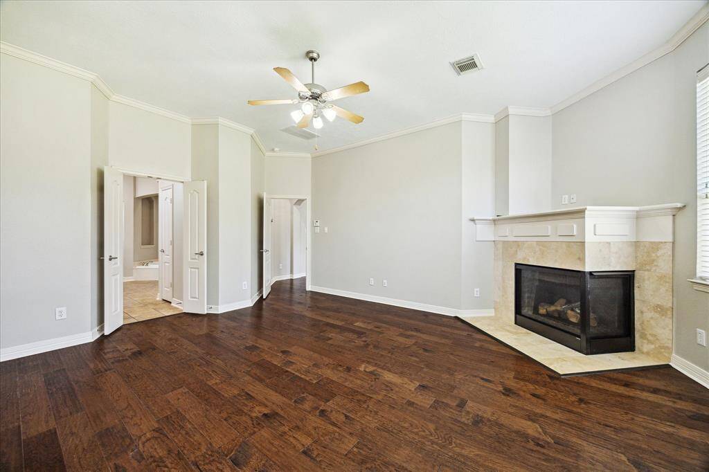 Neutral colors throughout, crown molding & hardwood floors throughout