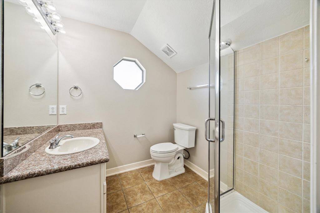 Shared full bath up off gameroom & fourth bedroom