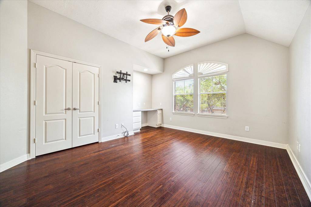 Second bedroom up w custom computer nook, celling fan, hardwoods & front yard views