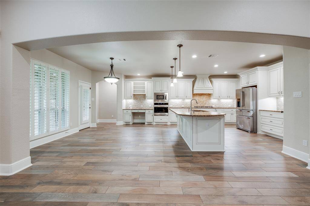 Spacious and open concept kitchen and breakfast area.