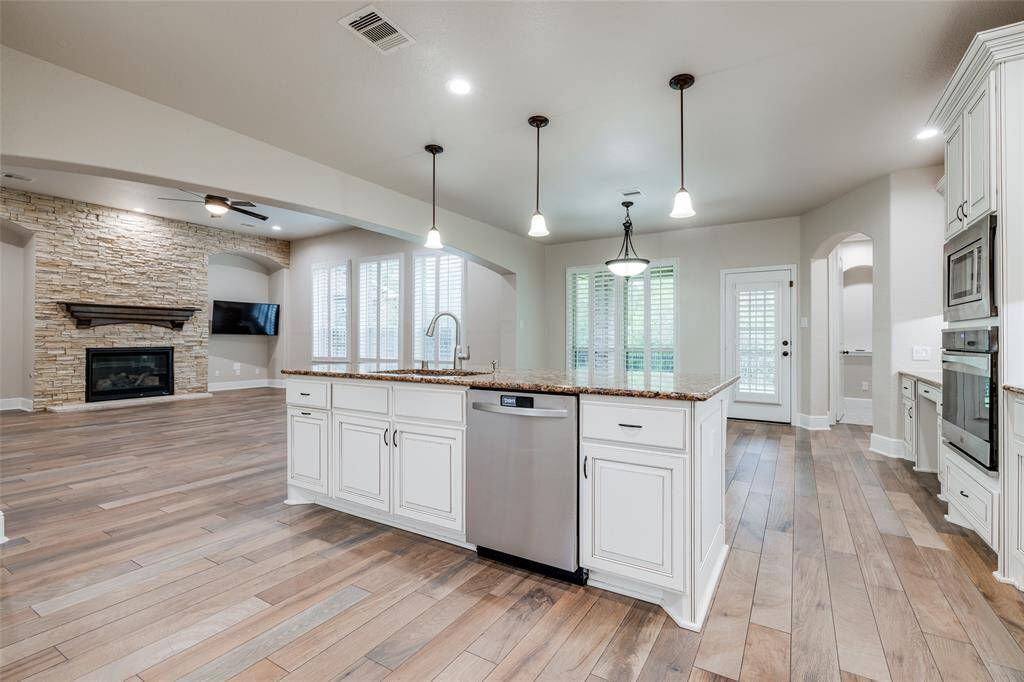 The kitchen's open concept flows through to the living/family room.