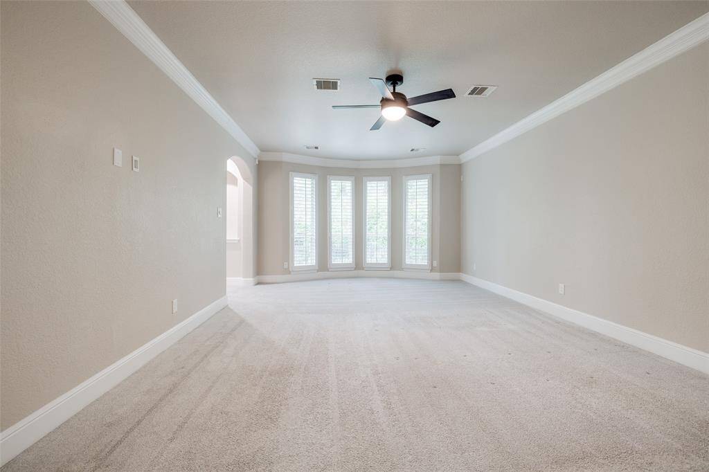 First floor primary suite with sitting area.