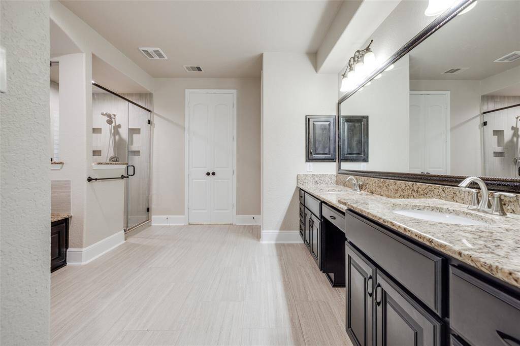 Primary on-suite bath.