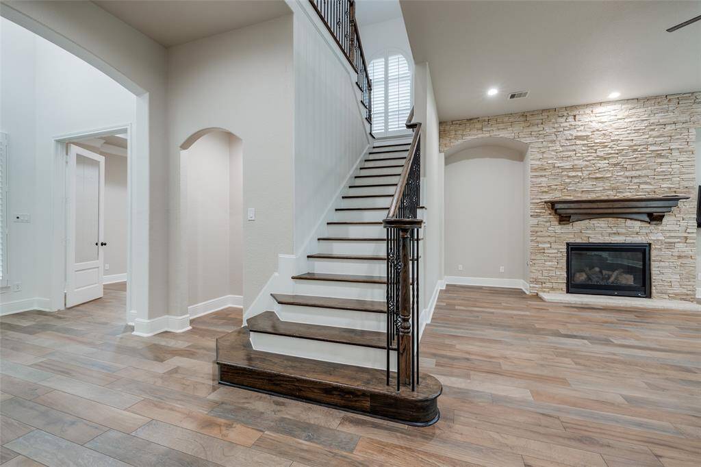 Beautiful wrought iron railing on stairs.