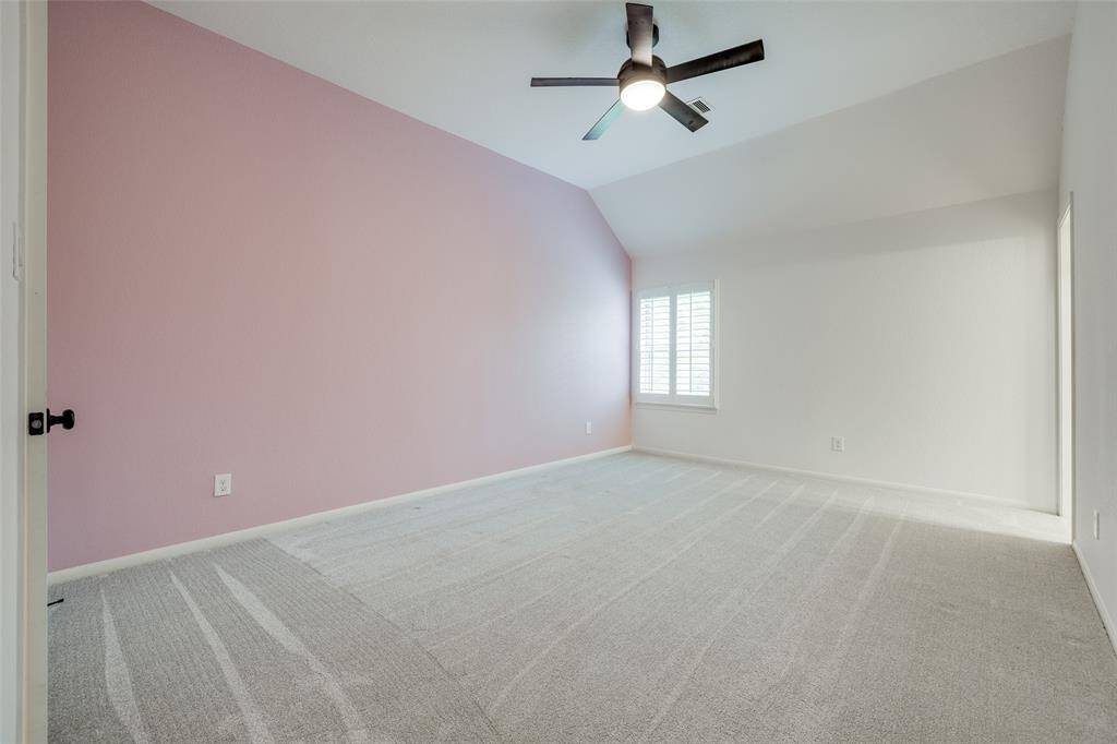 Second floor bedroom with bathroom sink.