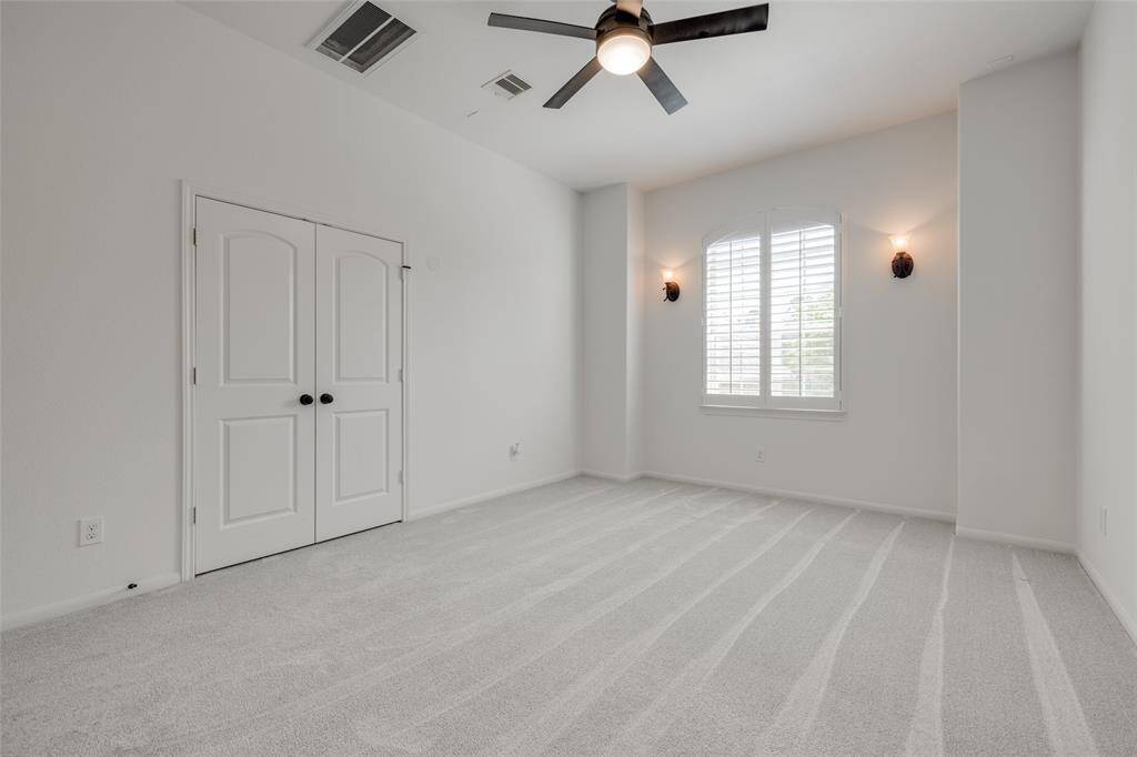 The 5th Bedroom with sconces is wired for media by builder or can be used as a 5th bedroom or home office.