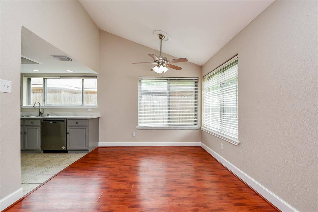Kitchen is open to dining area. Stainless appliances.