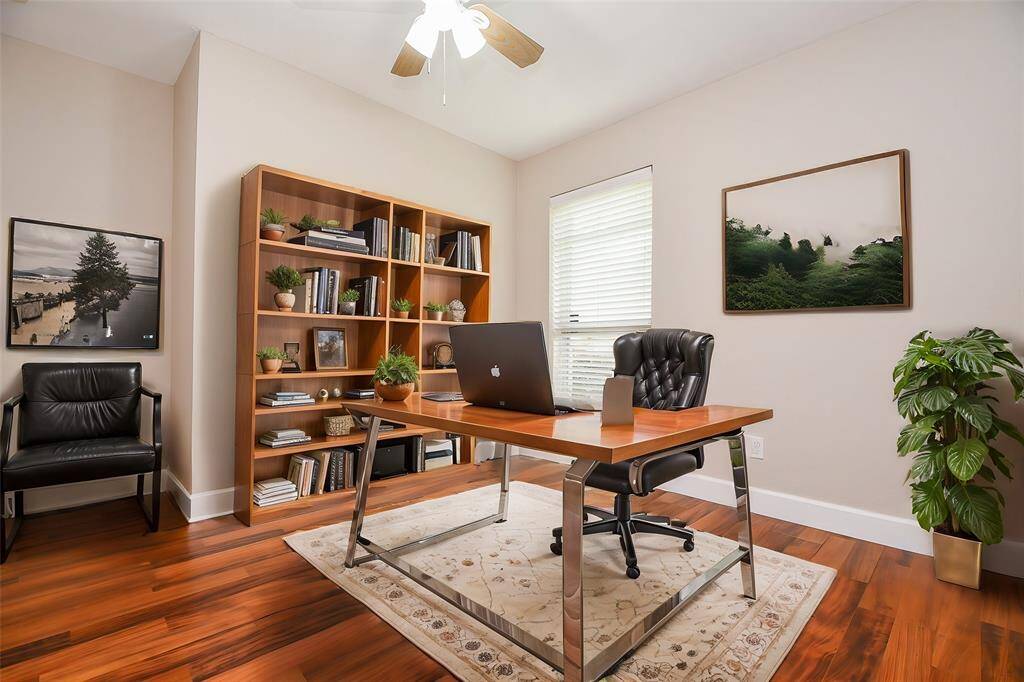This room functions as a home office or could flex to be a bedroom.