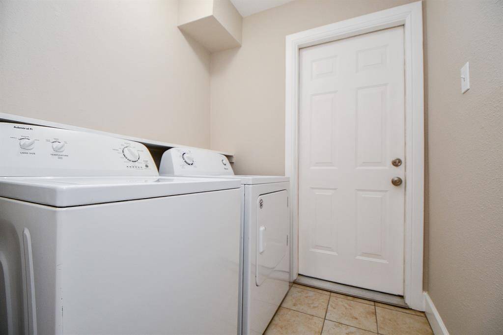 Utility room.  Washer and dryer to remain