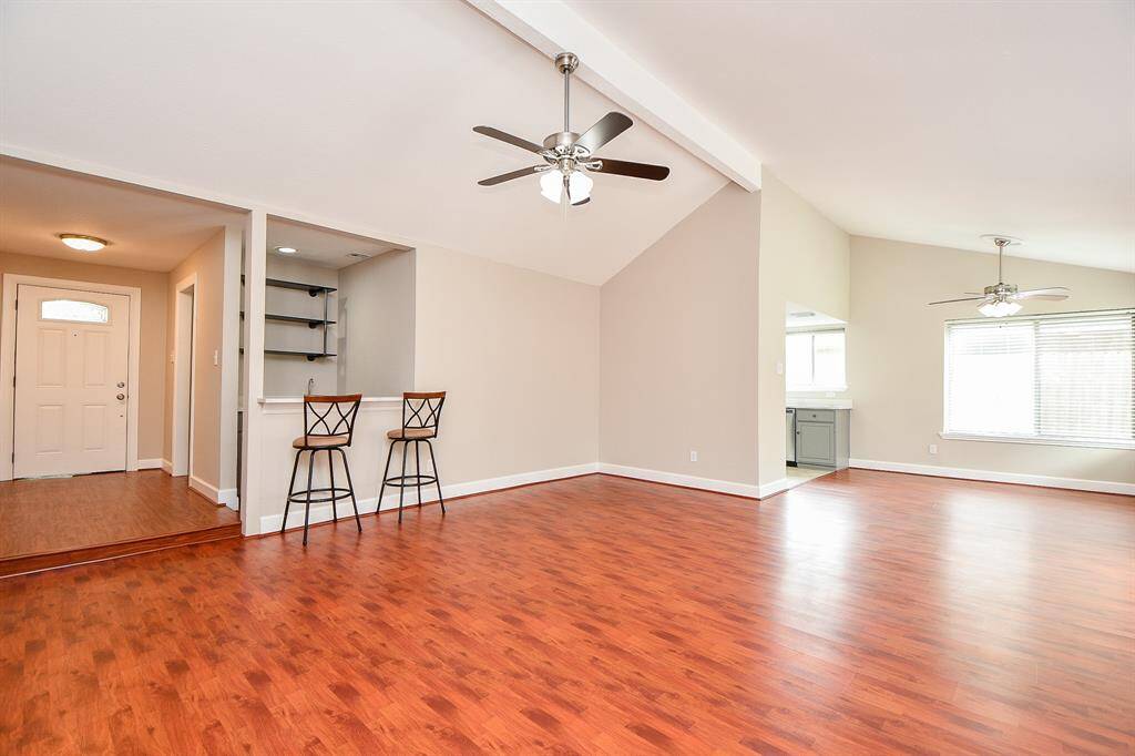 Entry plus one large living & dining combo + walk in wet bar with counter seating