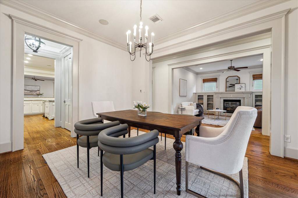 This stunning dining room features a nearby butler’s pantry and walk in pantry.