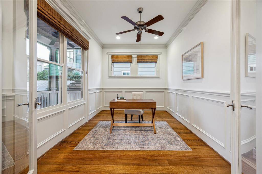 This bonus downstairs den with French doors is equally ideal as a lovely home office, study or gameroom.