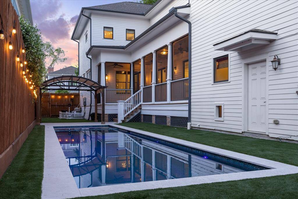 The rear stair hall features a separate exit and pet-door access to the rear yard.
