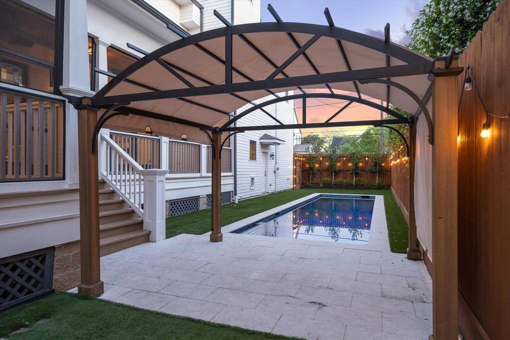 Plan your next al fresco gathering under the handsome dining pergola on the Turkish limestone patio.