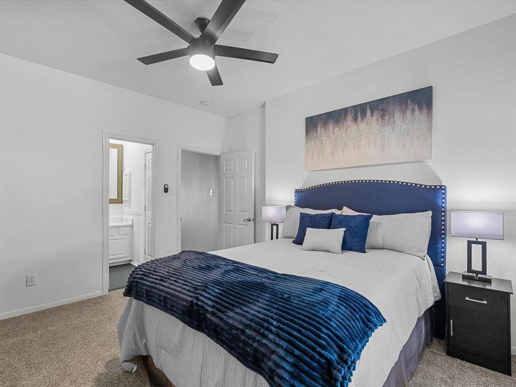 Modern meets elegant in this fourth and final bedroom upstairs!