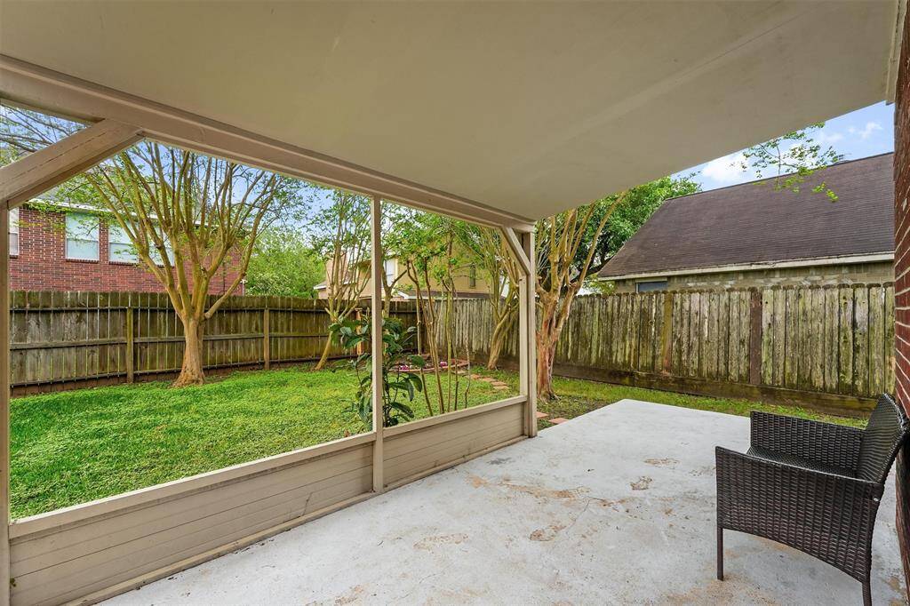 Step outside and extend your entertaining onto the charming covered patio, ideal for enjoying morning coffee or relaxing evenings.