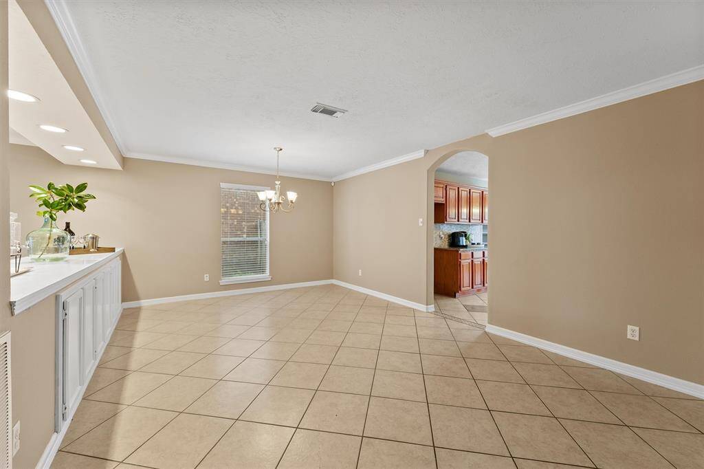 separate dining room where cherished holiday meals and lively dinner conversations will unfold.