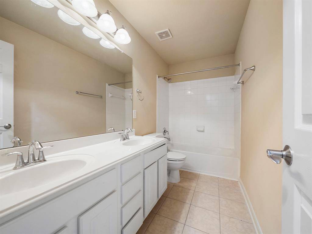 Second bathroom with double sinks